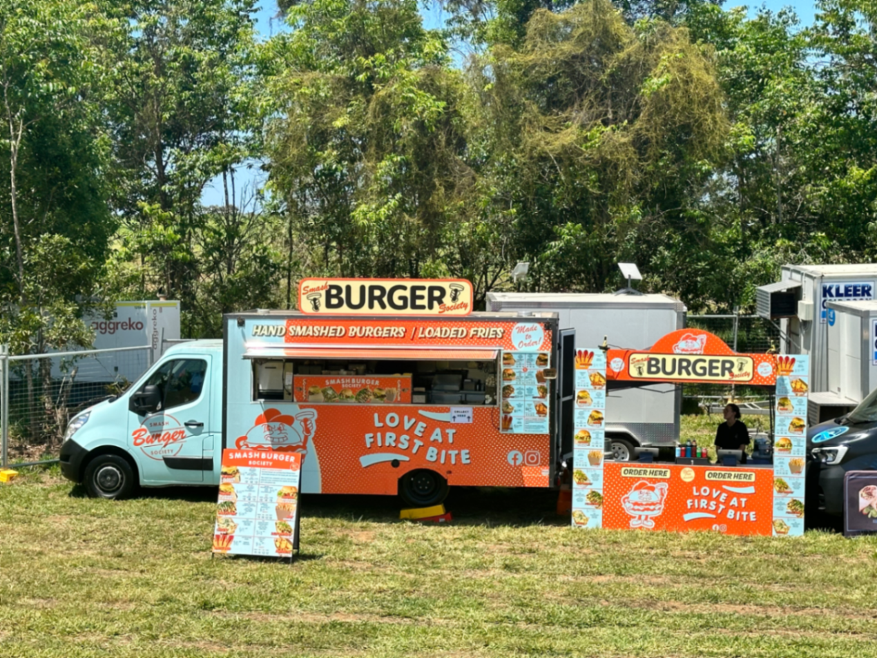 Smash Burger Society food truck and event marquee at a Queensland event site