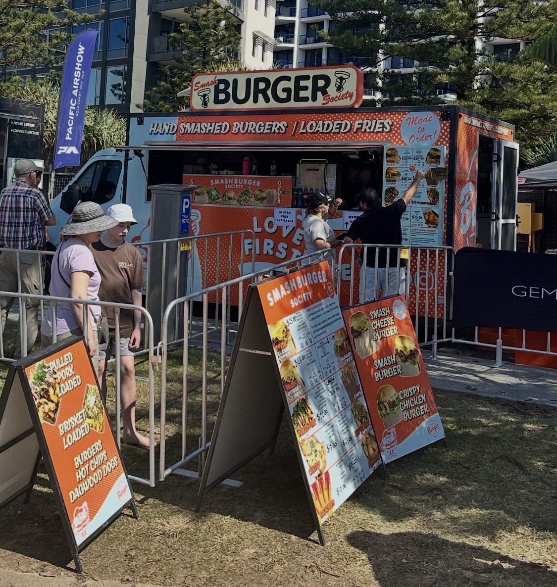 Smash Burger Society food truck serving a crowd at a Gold Coast festival